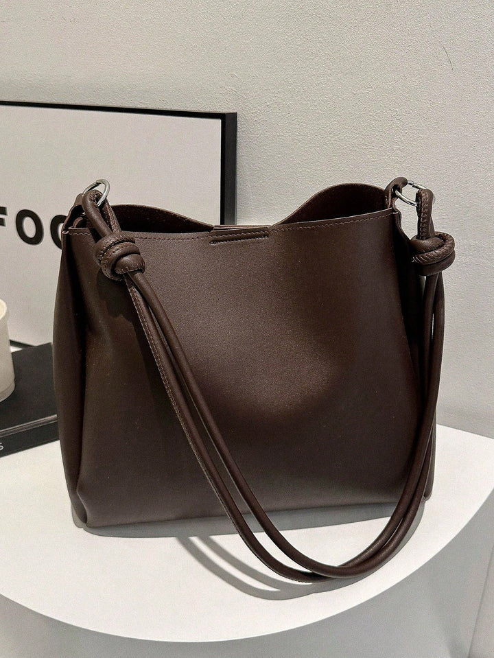 Bolso tote con detalle de pliegue