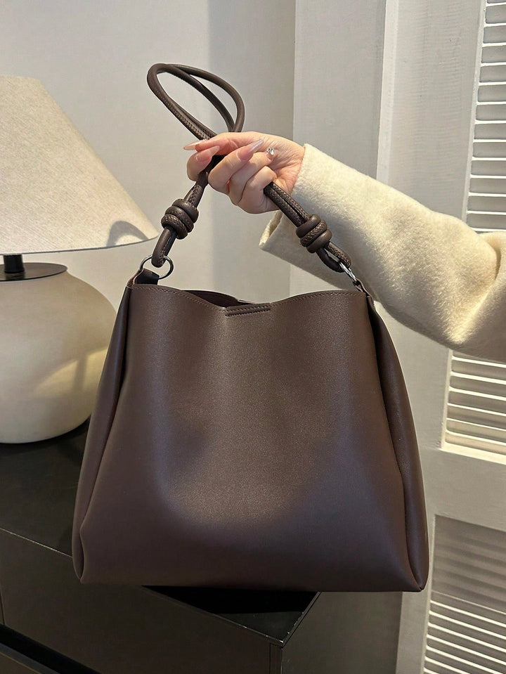 Bolso tote con detalle de pliegue