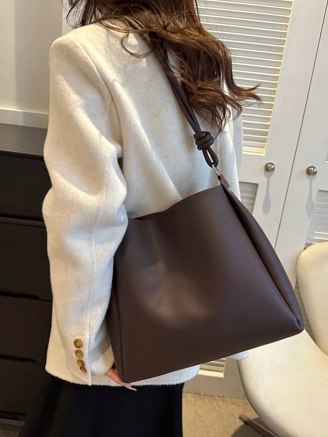 Bolso tote con detalle de pliegue