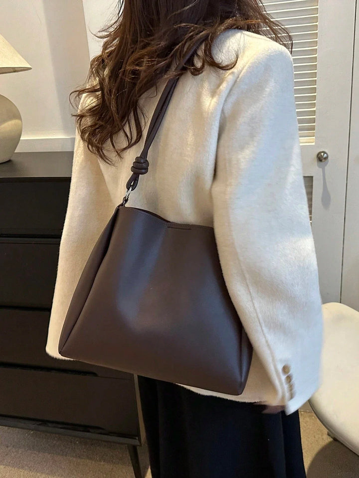 Bolso tote con detalle de pliegue