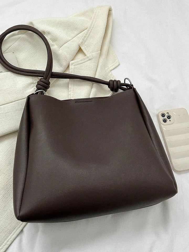 Bolso tote con detalle de pliegue