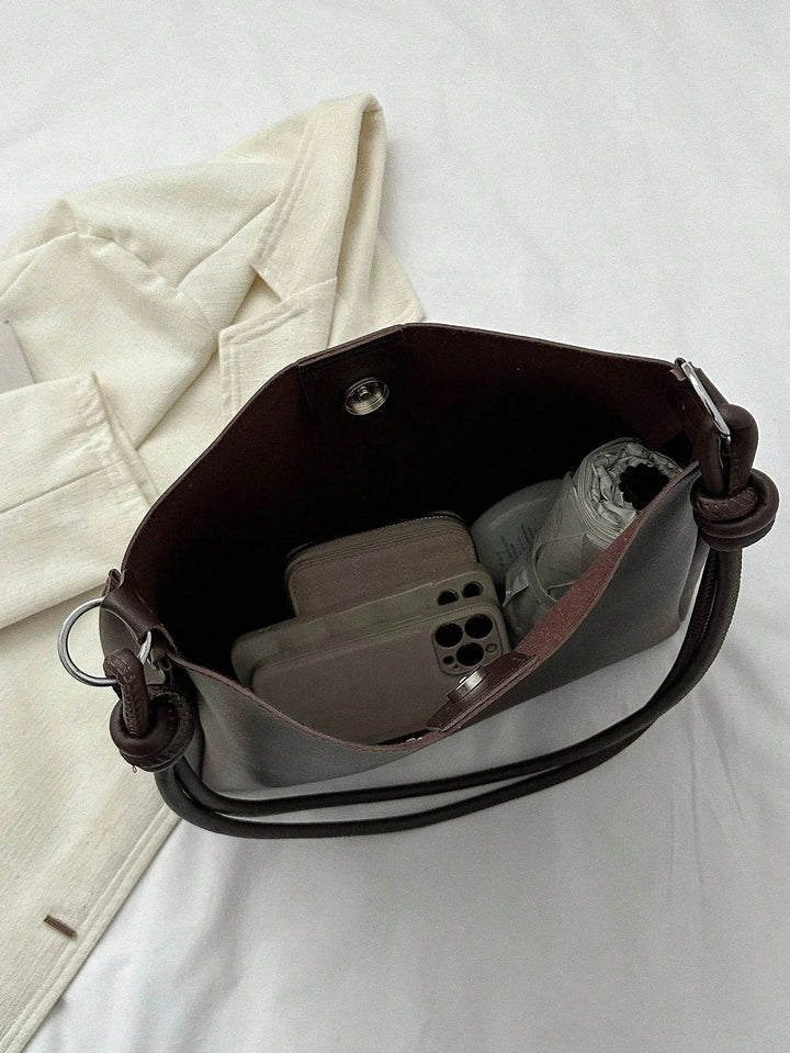Bolso tote con detalle de pliegue